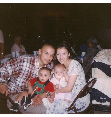 My mom, dad, me, and in the red n green shirt is the infamous Cousin Izrael <3 !!
